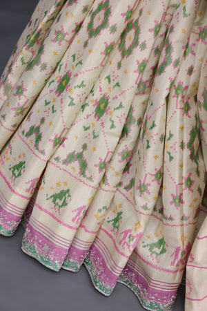 Pastel Patola with intricately designed handwork border