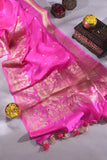 Raw Mango saree in bubble gum pink paired with a contrast dark green blouse