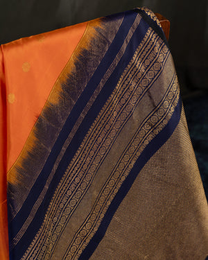 Deep orange Gadwal saree with handcrafted kalamkari appliqué work Border