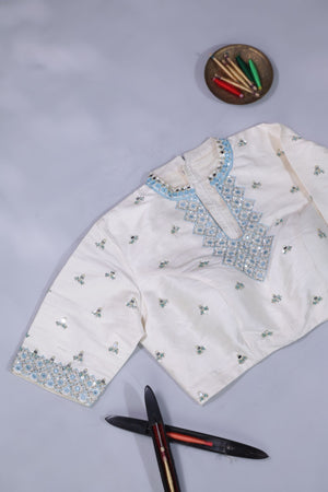 Elegant Crush Tissue saree in pastel blue with a stunning mirror work blouse