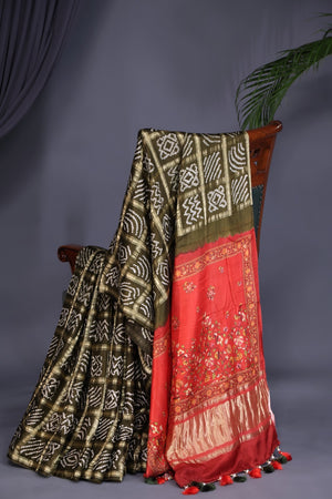 Bandini Gharchola in a lovely olive green shade with kalamkari pallu