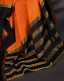 Orange mysore crepe silk saree with a stunning blouse pattern