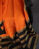 Orange mysore crepe silk saree with a stunning blouse pattern
