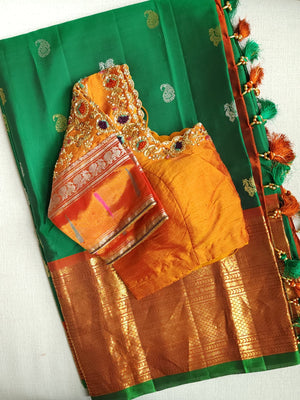 Traditional Green and rust orange Kanchipattu saree