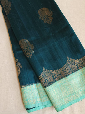 Peacock Green with aqua blue rawsilk saree with a stylish blouse