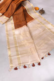 A beautiful vintage kanjeevaram in coppery rust with an ivory border