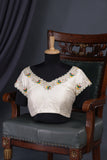Off white blouse with silver and multi color thread work