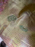 Gold kanjeevaram with contrast pink border and maggam work border