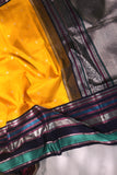 Kanjeevaram saree in a stunning shade of yellow and black