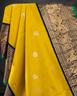 Gadwal Pattu saree in mustard yellow and navy blue