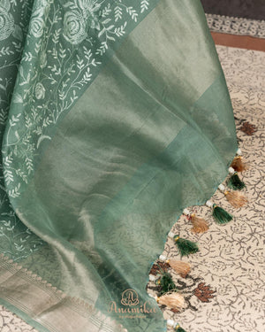 Organza saree in sage green with all over thread embroidery