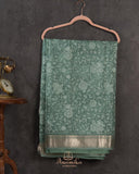 Organza saree in sage green with all over thread embroidery