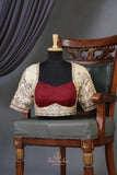 Tmeless kanjeevaram in a maroon shade