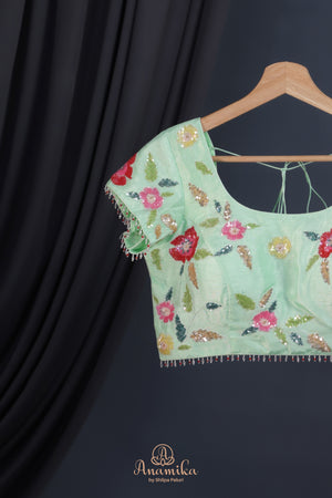 Mint Green Crepe Floral saree with hand worked border