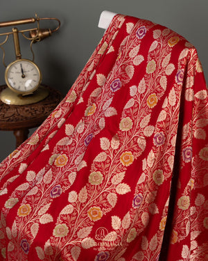 Red Banarasi saree with a heavy bridal zardosi work blouse