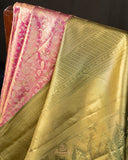 Stunning kanjeevaram in a dual tone peach pink color with meenakari border