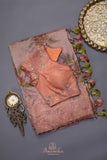 Crushed tissue saree in peach with beautiful cutwork border