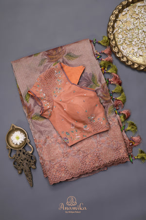 Crushed tissue saree in peach with beautiful cutwork border