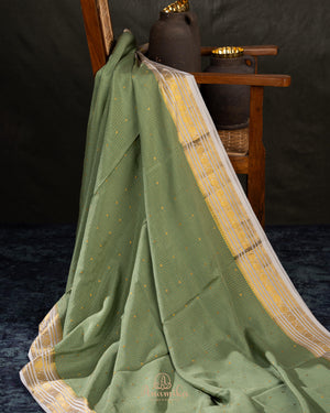 Pure mysore crepe silk saree in a beautiful shade of green and off white