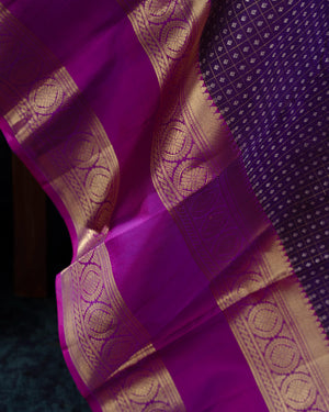 Deep purple Kanchipattu saree with contrast magenta gap border
