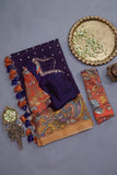 Deep purple bandini saree with a hand painted kalamkari border