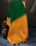 Kanchi soft silk saree in an evergreen green and light orange combo