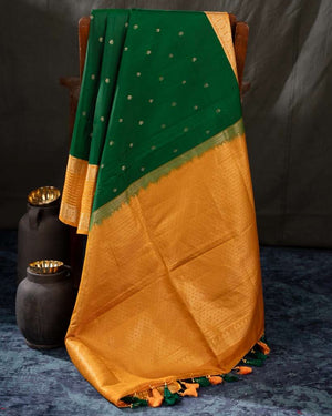 Kanchi soft silk saree in an evergreen green and light orange combo