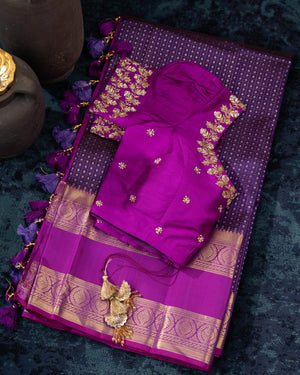 Deep purple Kanchipattu saree with contrast magenta gap border