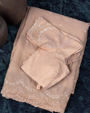 Brocade tissue georgette sarees with intricately embroidered border