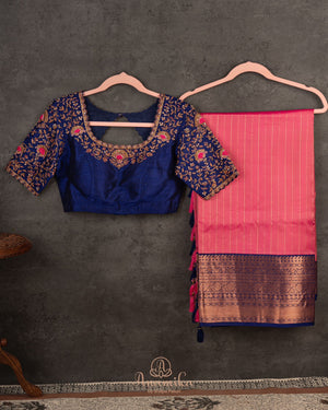 Kanchipattu saree in lovely rose pink shade with a contrast dark blue border