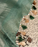 Organza saree in sage green with all over thread embroidery