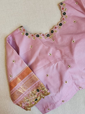 Kanjeevaram saree in bottle green with a baby pink border