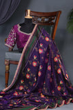 A classic patola in purple with a striking border