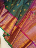Peacock Green Gadwal Kanchi Saree with a magenta pink border