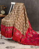 Twill Patola saree in a lovely shade of light brown and red