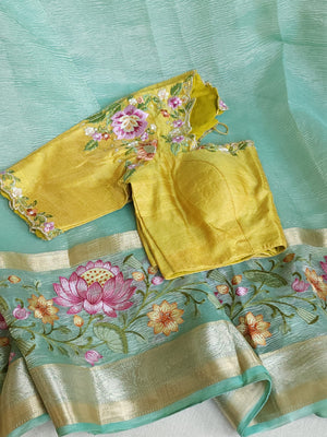 Sea Green Crush Tissue saree with a beautiful floral embroidered border