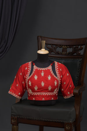 A beautiful red blouse with stunning neckline