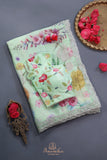 Mint Green Crepe Floral saree with hand worked border