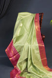 A dreamy kanjeevaram saree in a pastel green shade