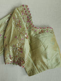 Very light pastel green tissue blouse with intricate embroidery