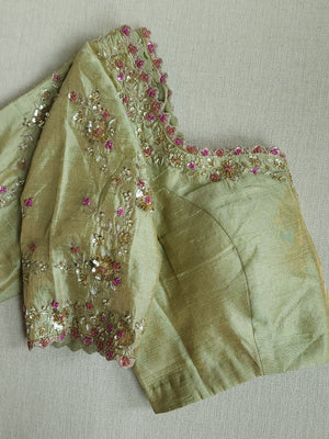 Very light pastel green tissue blouse with intricate embroidery