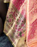 Stunning kanjeevaram in a dual tone peach pink color with meenakari border