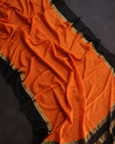 Orange mysore crepe silk saree with a stunning blouse pattern