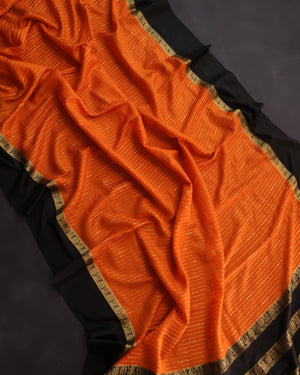 Orange mysore crepe silk saree with a stunning blouse pattern