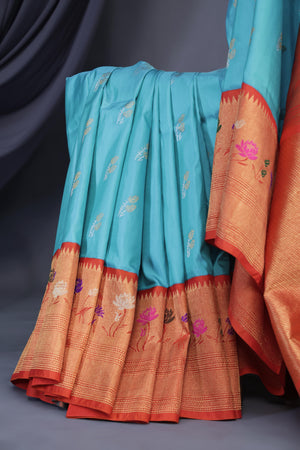 Aqua blue Gadwal saree with meenakari floral border in orange