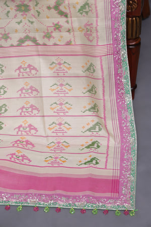 Pastel Patola with intricately designed handwork border