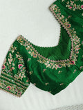 A stunning blouse in leaf green color with beautiful embroidery