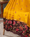 Yellow pure silk saree with contrast brown floral cutwork border