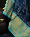 Timeless Gadwal Pattu saree in deep navy and teal blue