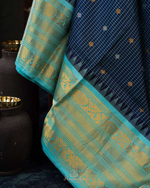 Timeless Gadwal Pattu saree in deep navy and teal blue